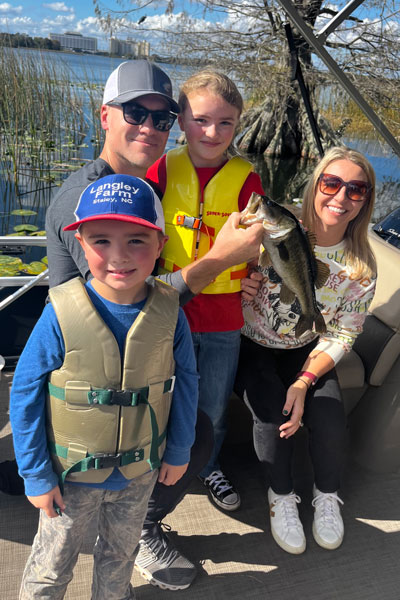 Brandon fishing with his family