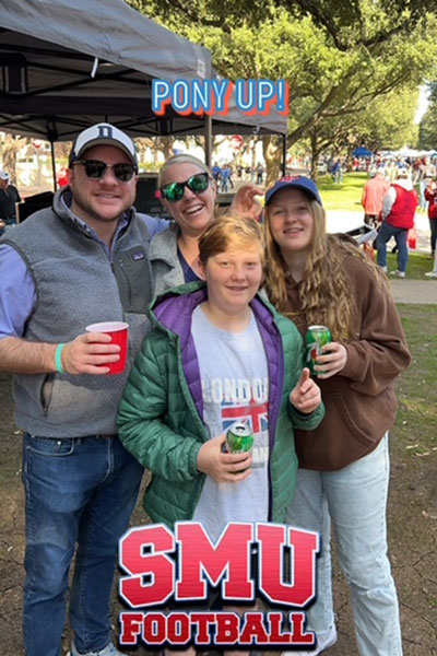 George at SMU game with his family