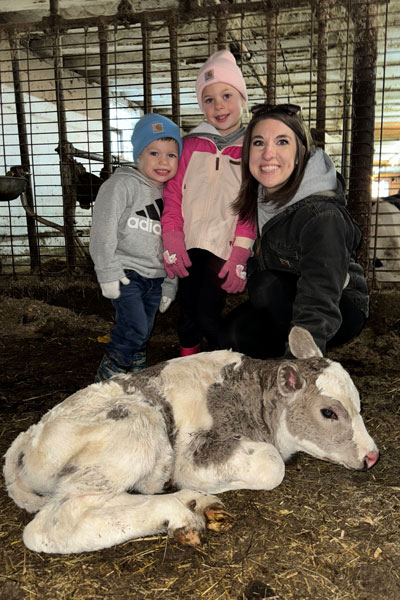 Cindy with her kids and calf